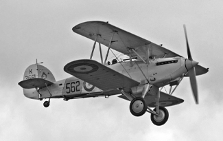 black and white airplane in the sky