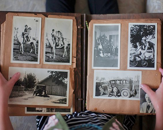 memory book full of black and white photos of residents and their loved ones