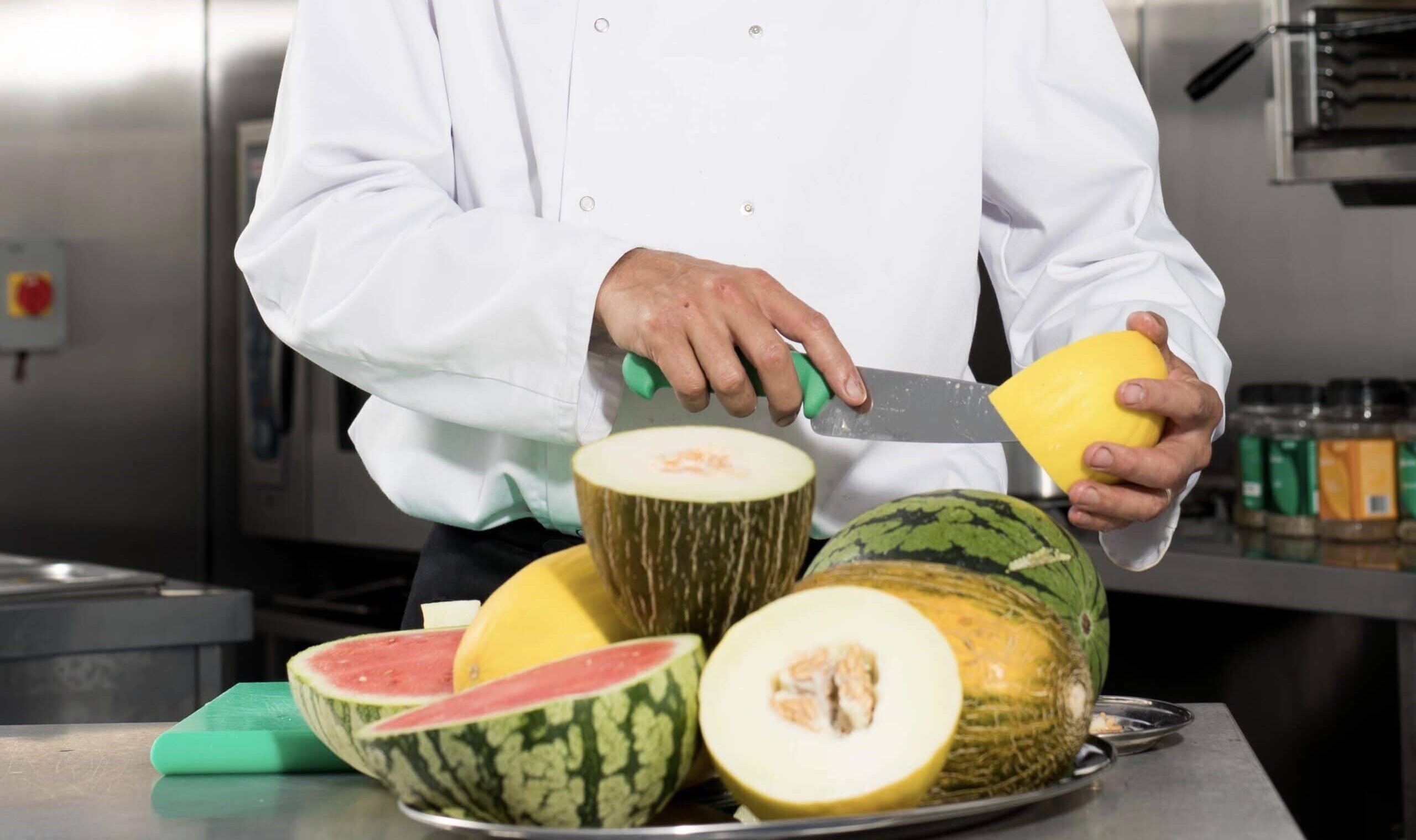 chef preparing fruit Close