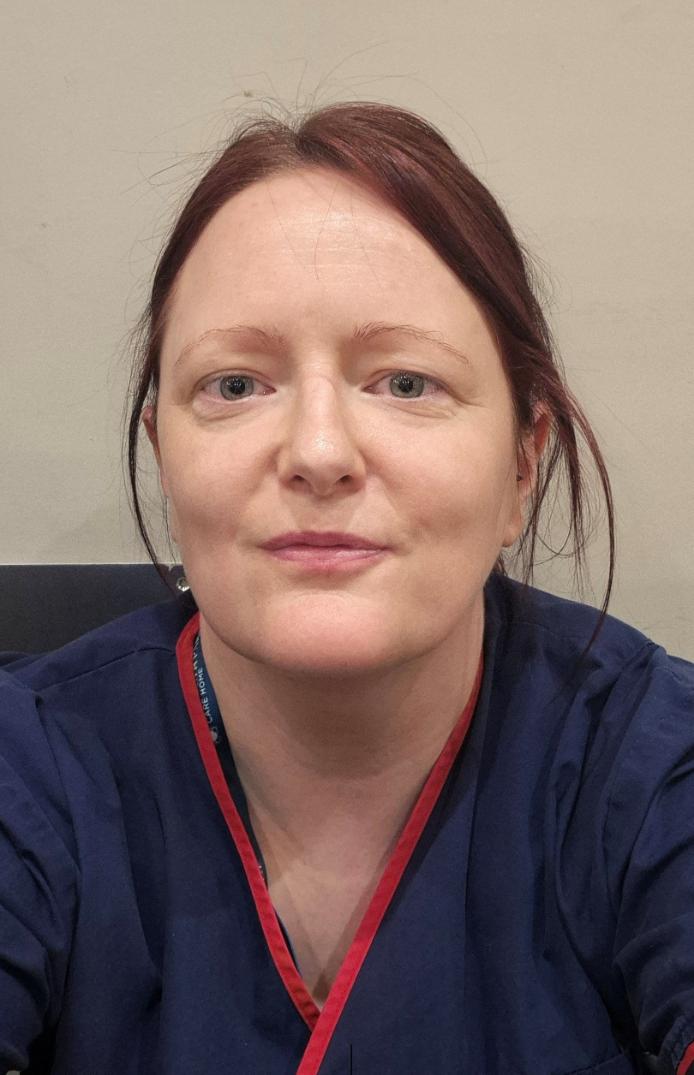 lady posing for staff photo