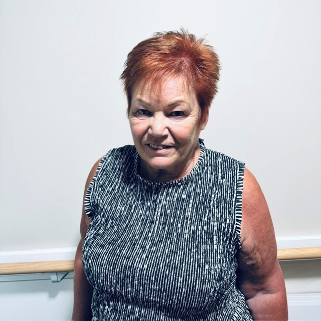 woman standing for staff photo